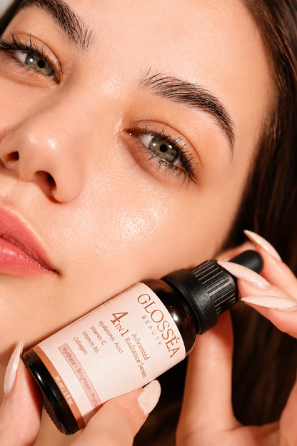 Glass dropper with Glosséa Beauty face serum containing hyaluronic acid and vitamin C for radiant skin.